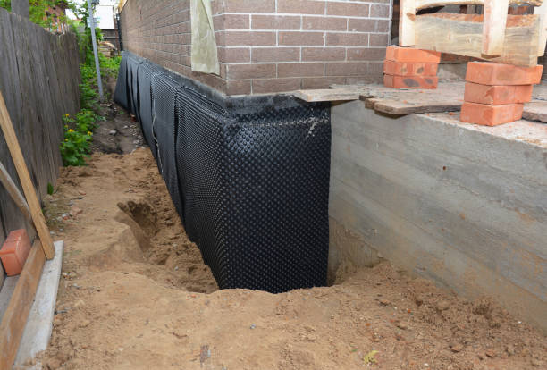 Happy homeowners after waterproofing job in Northvale
